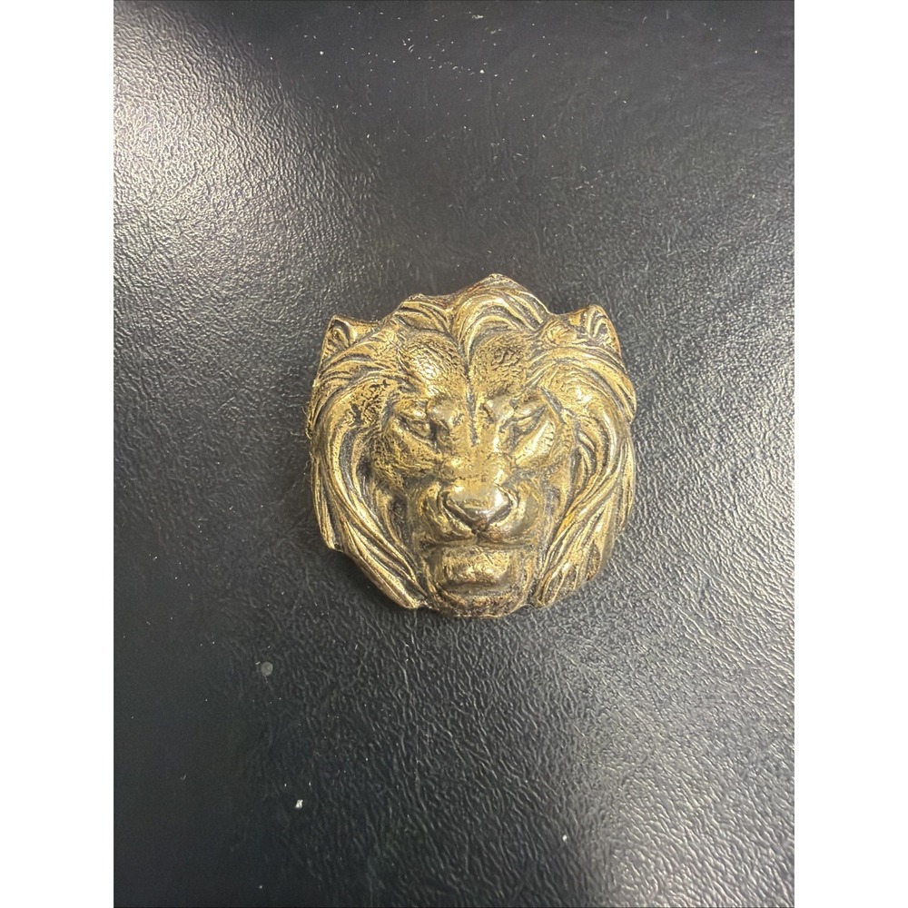 lion head stamping, often used for brooches
